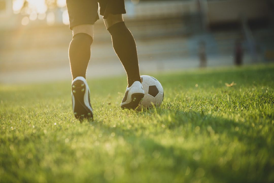 images/soccer-player-action-stadium.jpg