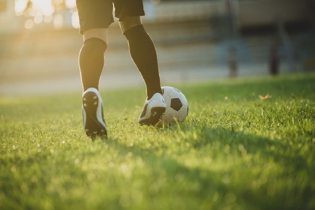 images/soccer-player-action-stadium.jpg